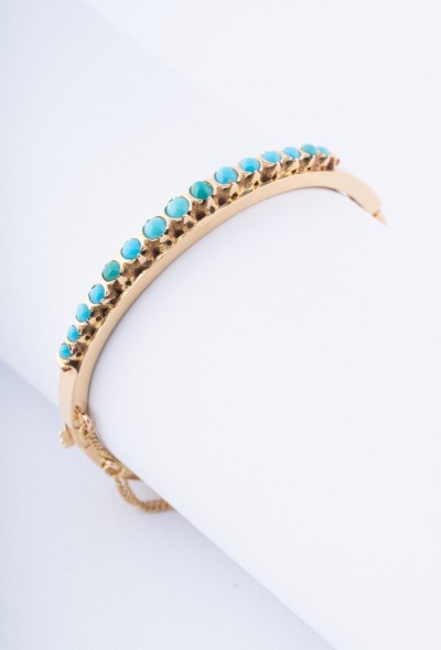 Gouden bangle met turkooisen