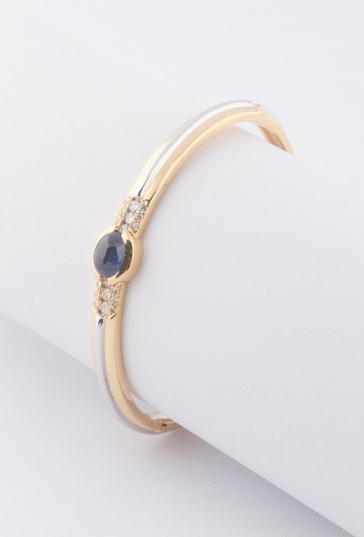 Wit/geel gouden bangle van het merk Le Chic met saffier en briljanten