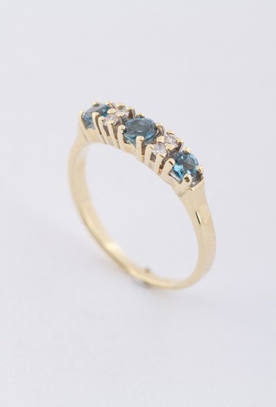 Gouden ring met 3 topazen en 4 diamanten (8-kant)
