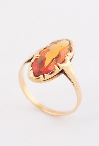Gouden ring met een gele topaas
