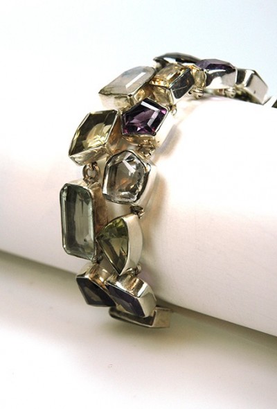 Zilveren schakelarmband met diverse edelstenen