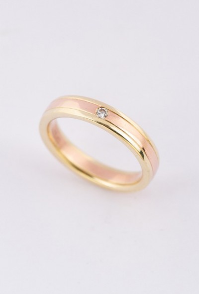 Rosé/geel gouden ring met een briljant