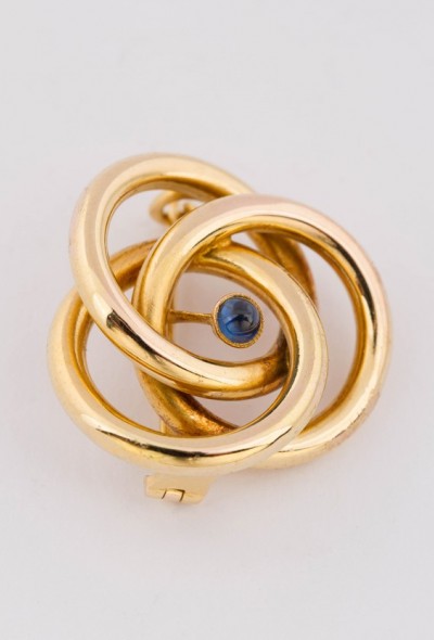 Gouden broche met saffier
