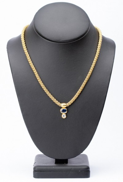 Gouden collier met een hanger met saffier en briljant (Fope)