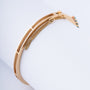 Gouden bangle met turkooisen