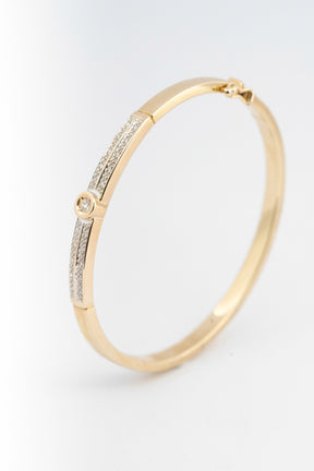 Geel gouden bangle met briljanten
