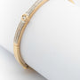 Geel gouden bangle met briljanten