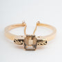Geel gouden klem armband met veiligheidsketting en rook kwarts (Bwg)