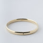Geel gouden bangle met scharnier sluiting.