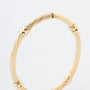 Geel gouden bewerkte bangle
