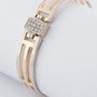 Wit/geelgouden spangen bangle met briljanten en scharniersluiting