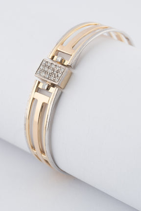 Wit/geelgouden spangen bangle met briljanten en scharniersluiting