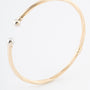 Geelgouden klem bangle met veer