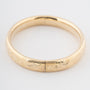 Geelgouden gegraveerde bangle met scharniersluiting