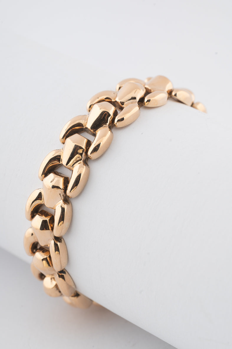 Yellow gold link bracelet with safety chain