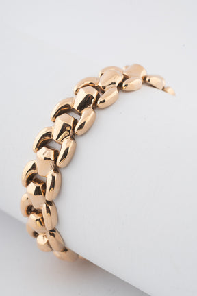 Yellow gold link bracelet with safety chain