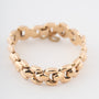 Yellow gold link bracelet with safety chain