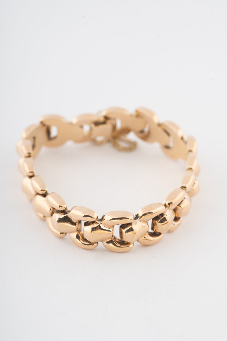 Yellow gold link bracelet with safety chain