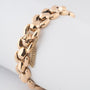 Yellow gold link bracelet with safety chain