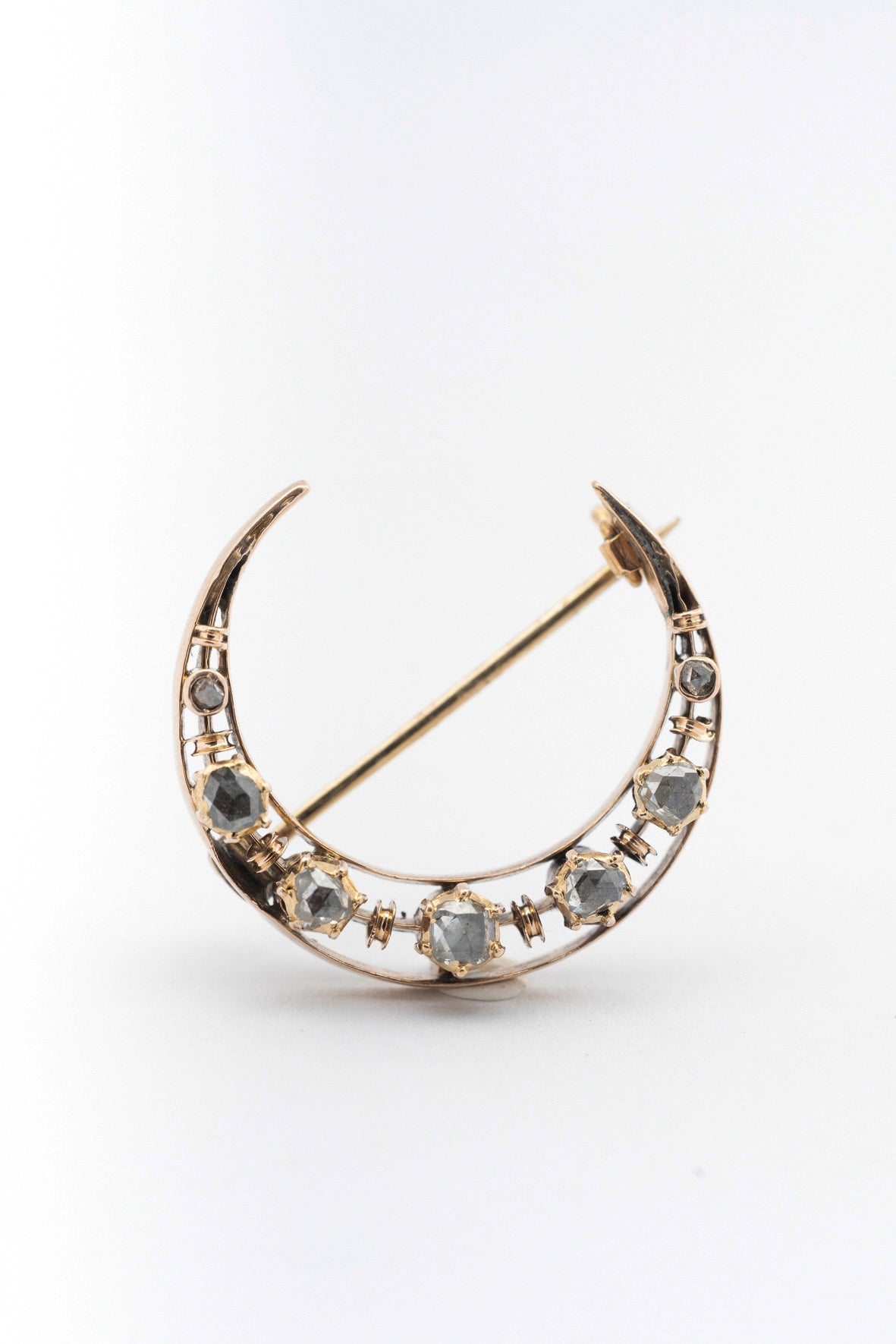 Antique yellow gold moon brooch with diamonds