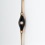 Antieke geel gouden brochette met onyx en parels