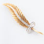 Wit/geel gouden veer broche met diamanten