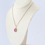 Gouden hanger met synth. roze saffier aan gouden Venetiaans collier