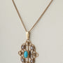 Oude gouden hanger met turkoois en parels aan ouden gourmet collier