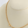 Geel gouden hart met briljanten, saffier, robijn en smaragd aan geel gouden koord collier