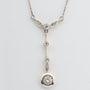 Antique white/yellow gold pendant with brilliant and rose-cut diamonds on a white gold necklace