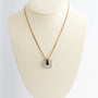 White/yellow gold pendant with brilliant-cut diamonds on a yellow gold gourmet chain