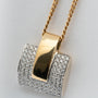 White/yellow gold pendant with brilliant-cut diamonds on a yellow gold gourmet chain