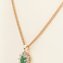 Yellow gold entourage pendant with emerald and diamonds on yellow gold gourmet necklace