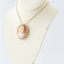 Antique yellow gold cameo/brooch pendant on a yellow gold necklace