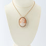 Antique yellow gold cameo/brooch pendant on a yellow gold necklace