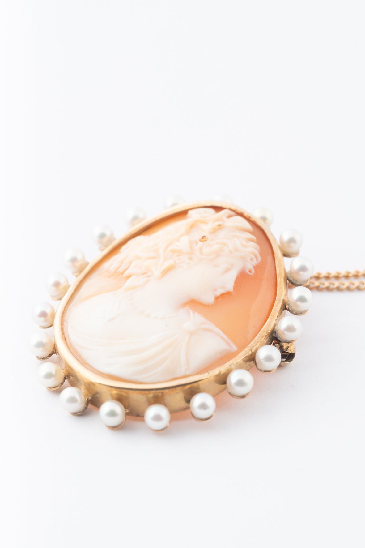 Antique yellow gold cameo/brooch pendant on a yellow gold necklace