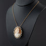 Antique yellow gold cameo/brooch pendant on a yellow gold necklace