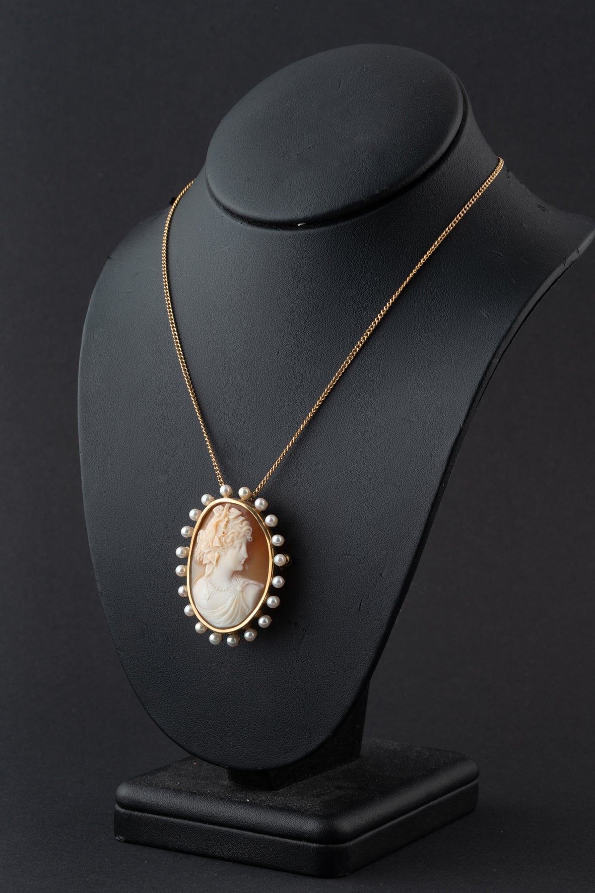 Antique yellow gold cameo/brooch pendant on a yellow gold necklace