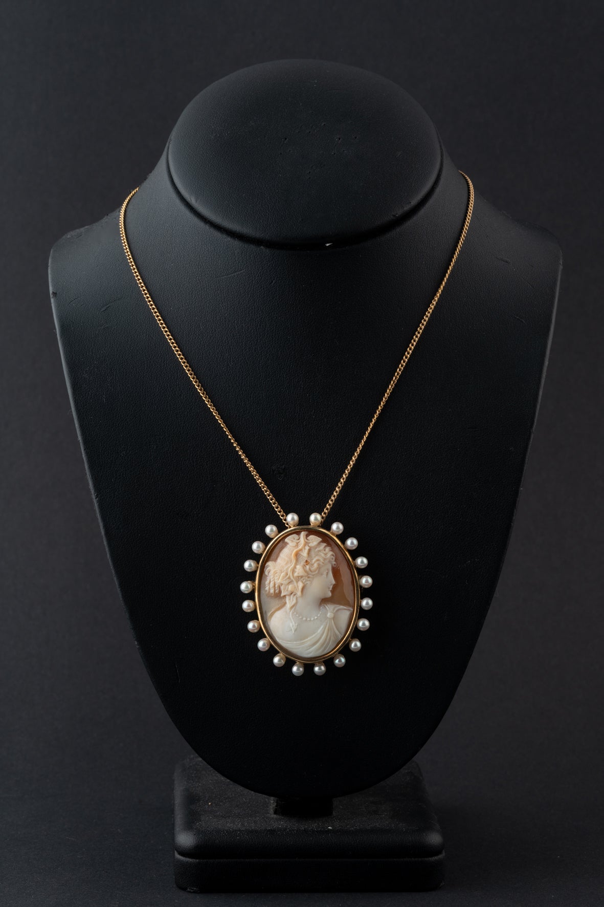Antique yellow gold cameo/brooch pendant on a yellow gold necklace