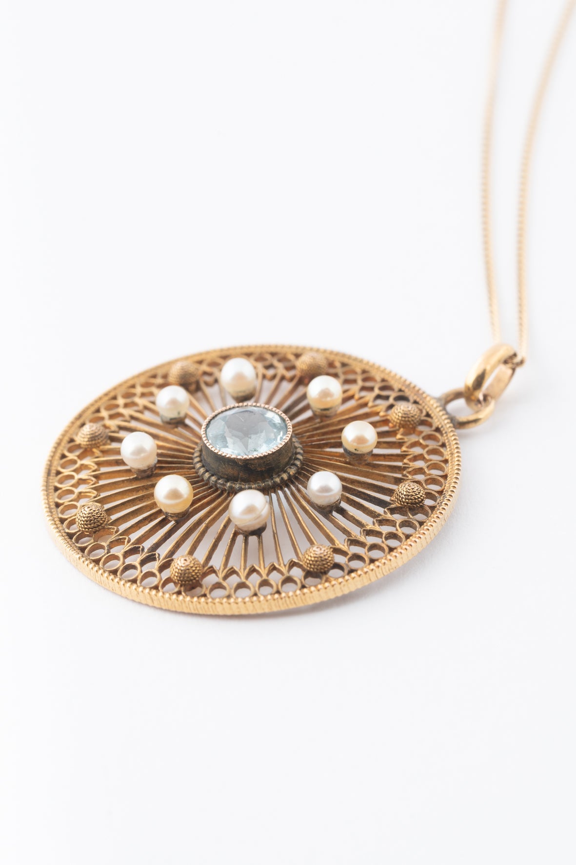 Antique yellow gold pendant with aquamarine and pearls on a gourmet chain