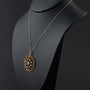 Antique yellow gold pendant with aquamarine and pearls on a gourmet chain