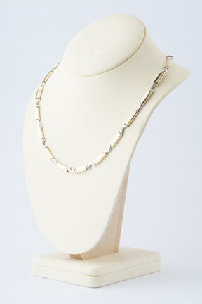 Witgouden/geelgouden schakel collier