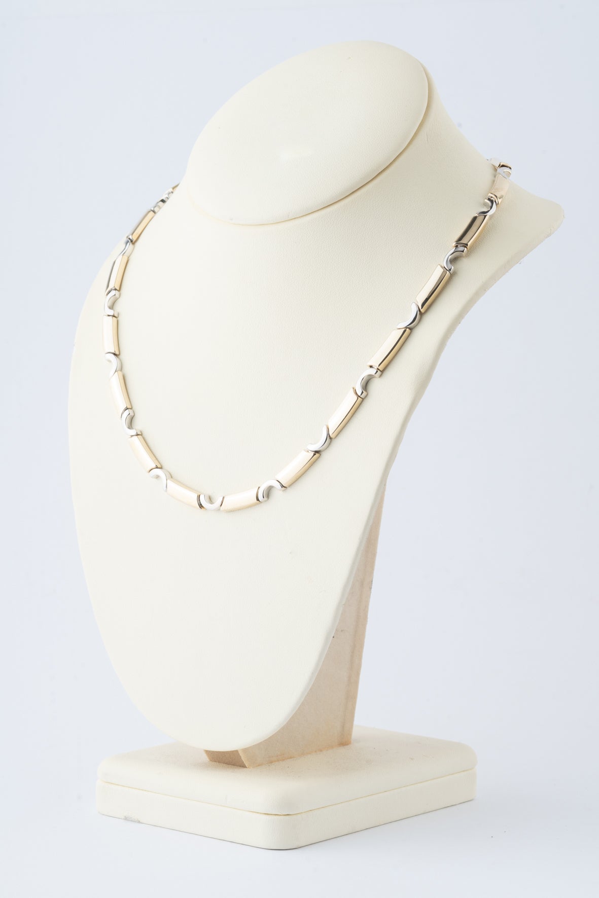 Witgouden/geelgouden schakel collier