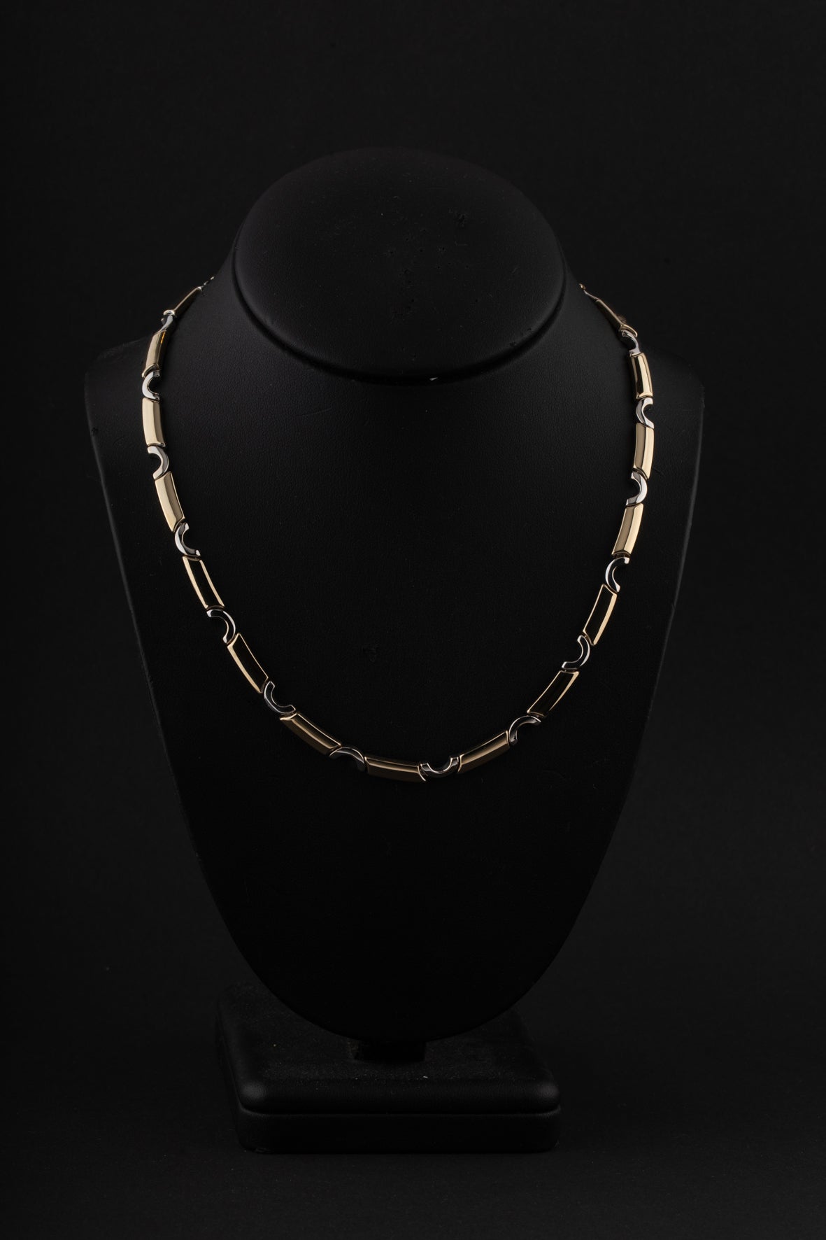 Witgouden/geelgouden schakel collier