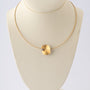 Geelgouden collier met platina hanger en bol met briljant van Niessing