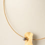 Geelgouden collier met platina hanger en bol met briljant van Niessing