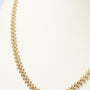 Geelgouden bolletjes collier