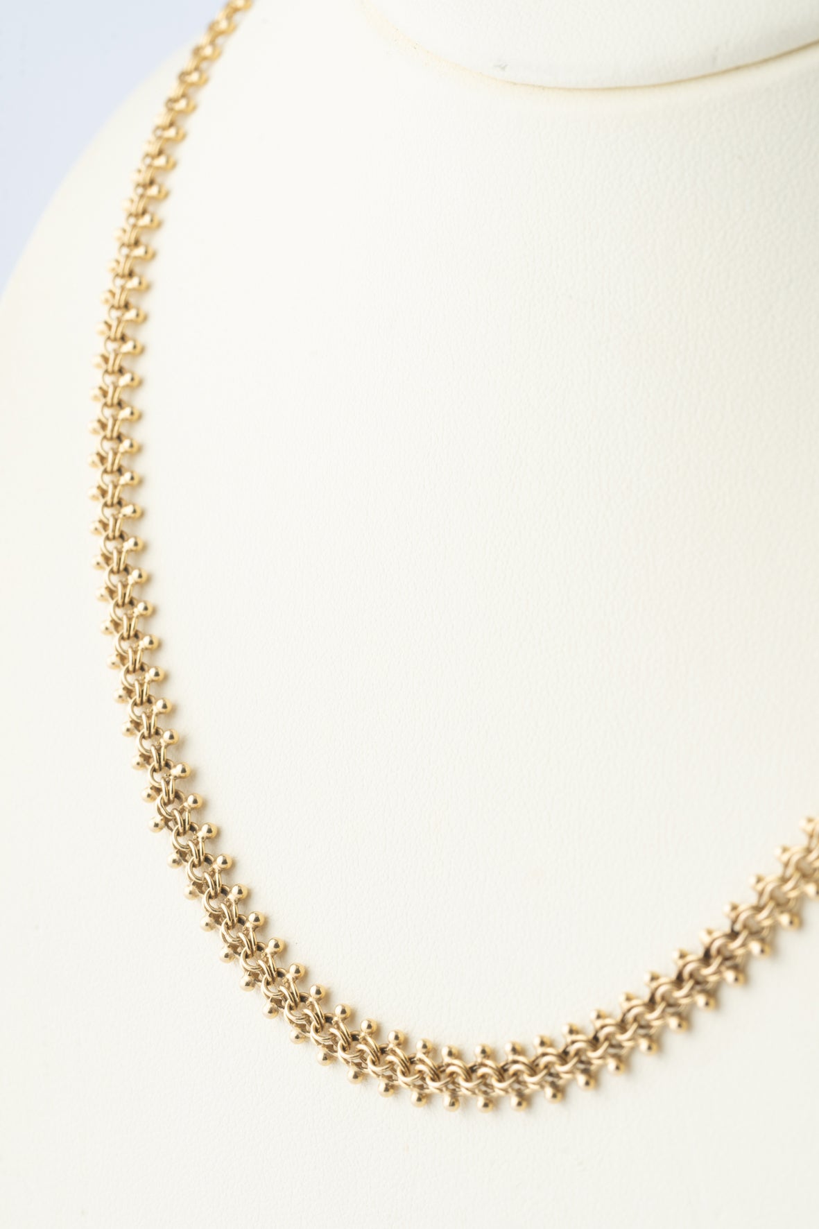 Geelgouden bolletjes collier