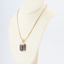 Geelgouden hanger met synthetische korund aan geelgouden schakel collier