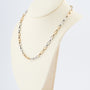 Wit/geelgouden schakel collier